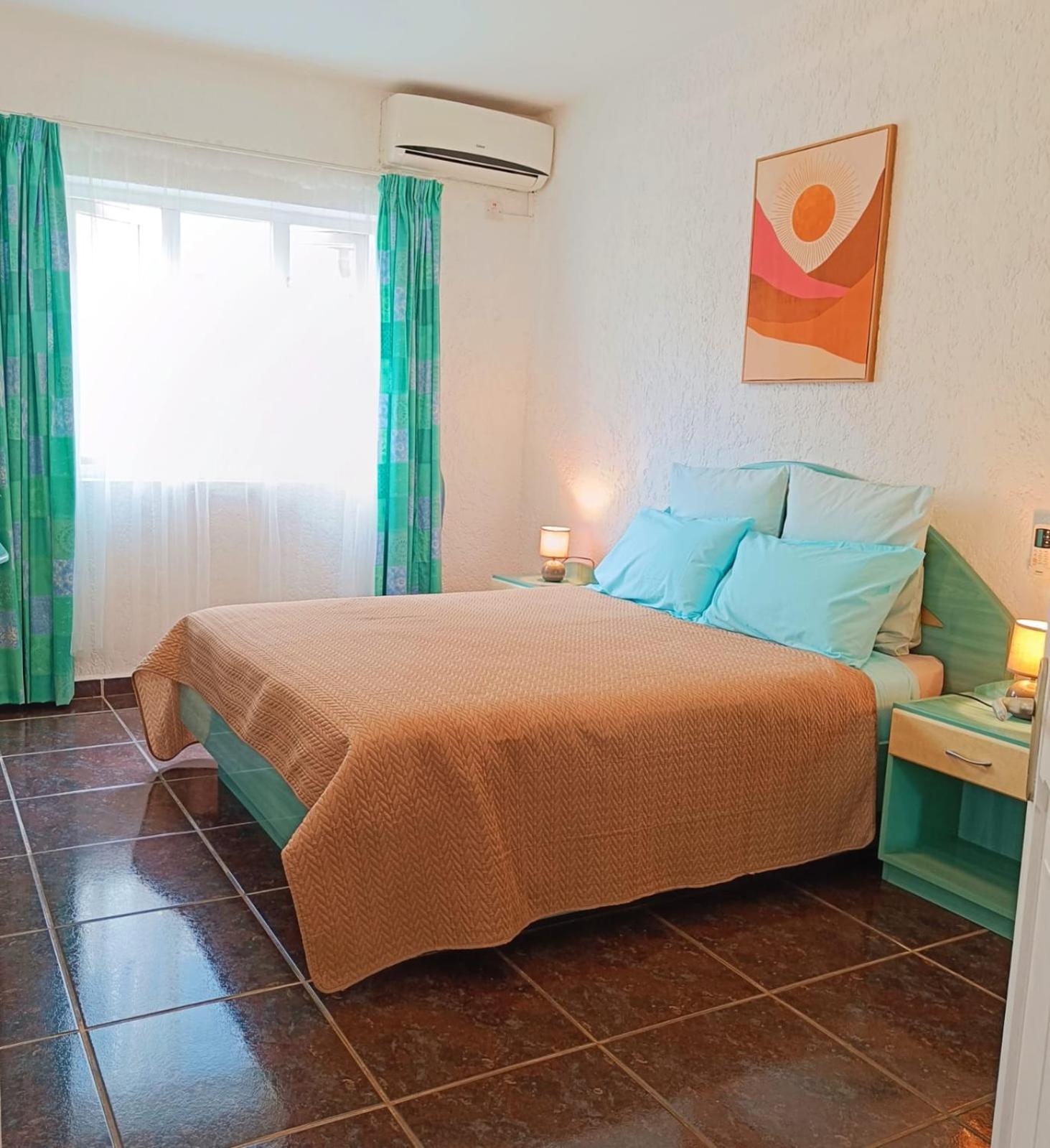 The Coastal Apartment Flic en Flac Bagian luar foto